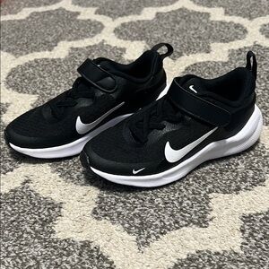 Kids’ Nike Revolution sneakers, black and white, size 11 NIB!